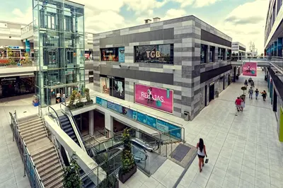 an overhead view of a shopping mall with people in it at Sagunto Beach Apartment 500m to Sea, WiFi 600Mb y AC in Puerto de Sagunto