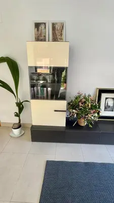 a room with a counter with two potted plants at Apartment 300 m from the beach ,parking , breakfast in Valencia