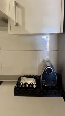 a toaster sitting on a counter in a kitchen at Apartment 300 m from the beach ,parking , breakfast in Valencia