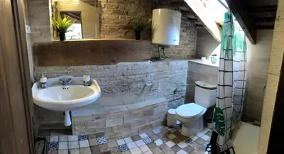a bathroom with a sink and a toilet at Beautiful penthouse with two terraces near the sea in Valencia