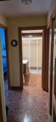 an empty room with a desk and a window at A fantastic apartment on the beach in Canet de Berenguer
