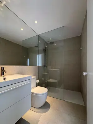 a bathroom with a toilet and a sink and a shower at Superloft in Burjasot