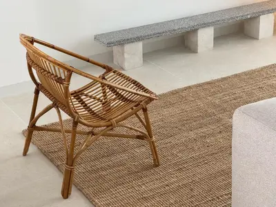 a wooden chair sitting in front of a table at Superloft in Burjasot