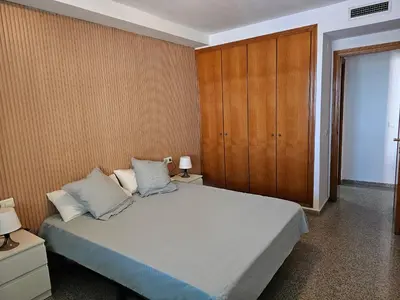 a small kitchen with a sink and a washer at Apartamento Brisa Patacona in Valencia