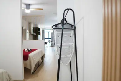 a room with a room with a bed and a ladder at Céntrico & Lujoso in Valencia