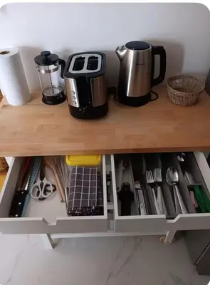 a shelf with a coffee pot and a coffee maker at Sueños en la playa in Valencia