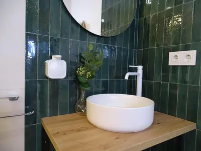 a bathroom with a white sink and a mirror at MDB 52A - Loft Valencia in Valencia