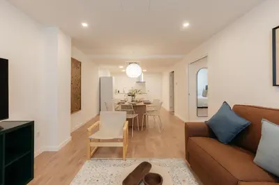 a living room with a couch and a table at Doce de Colón Requena in Requena