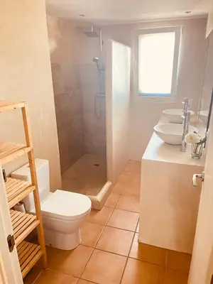 a bathroom with a shower and a toilet and a sink at Villa 20min Valencia - Playas in San Antonio de Banageber