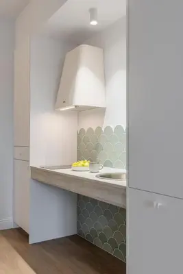 a kitchen with a sink and a counter top at Design and style next to Playa de Valencia in Valencia