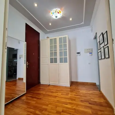 an empty room with a door and a mirror at The Plaza Residence in Valencia