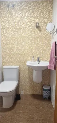a bathroom with a toilet and a sink at Calma mediterránea in Favareta