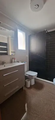 a bathroom with a toilet and a sink and a shower at Calma mediterránea in Favareta
