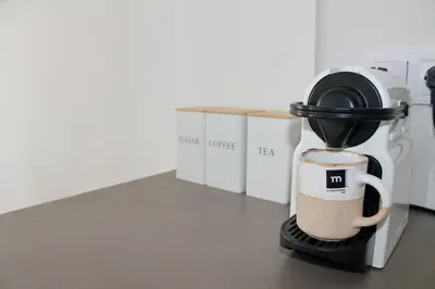 a coffee maker is sitting on a counter at Arenisca Zarco in Valencia