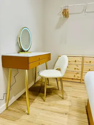 a dressing table with a mirror and a chair at Modern Apartment with Style near Center in Valencia
