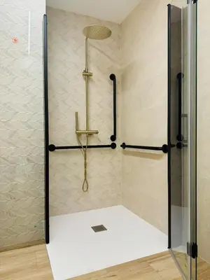 a shower with a glass door in a bathroom at Modern Apartment with Style near Center in Valencia