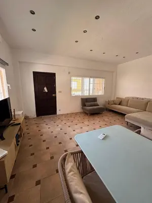 a large living room with a couch and a table at El Encanto del Perelló in Sueca