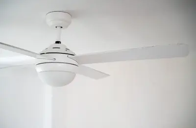 a white ceiling fan sitting on a ceiling at Apartamento Ciudad de las Ciencias con Terraza in Valencia