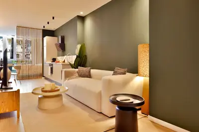 a living room with a white couch and a table at SariStays Valencia Modern & O in Valencia