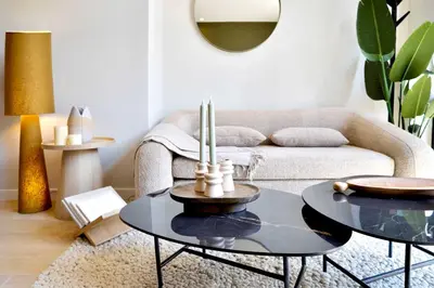 a living room with a couch and a table at SariStays Valencia Finca Verde L in Valencia