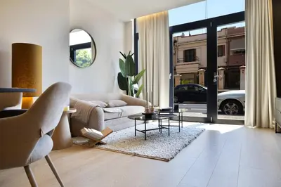 a living room with a couch and a table at SariStays Valencia Finca Verde L in Valencia