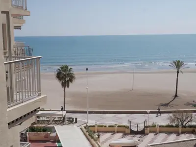 a view of the beach from the balcony of a building at El Raco, C-5-10 in Cullera