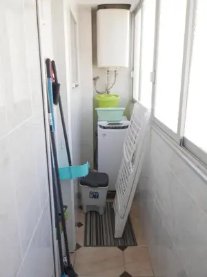 a small bathroom with a toilet and a window at El Raco, C-5-10 in Cullera