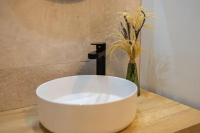 a white sink sitting on a counter in a bathroom at GuestReady - Inviting Valencia retreat in Valencia