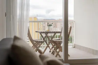 a table and chairs on a balcony with a view at Fabuloso Piso Playa Canet de Bereguer Alquiler minimo 11 noches llamar al 64039uno856 in Canet de Berenguer