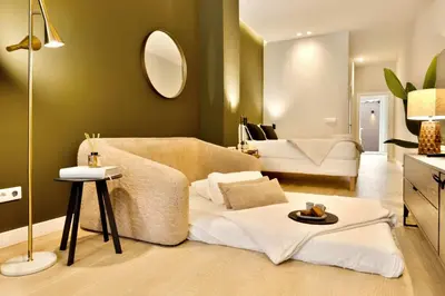 a living room with a couch and a table at SariStays Valencia City Center L in Valencia