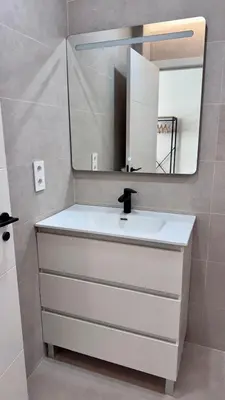 a bathroom with a white sink and a mirror at Apartamento Boutique Valencia 4-Pax - A-1 in Valencia