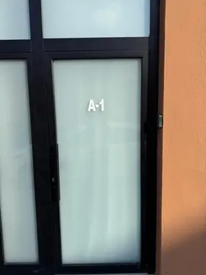 a glass door with the words art on it at Apartamento Boutique Valencia 4-Pax - A-1 in Valencia
