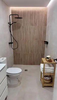 a bathroom with a shower and a toilet in it at Apartamento Boutique Valencia 4-Pax - A-1 in Valencia