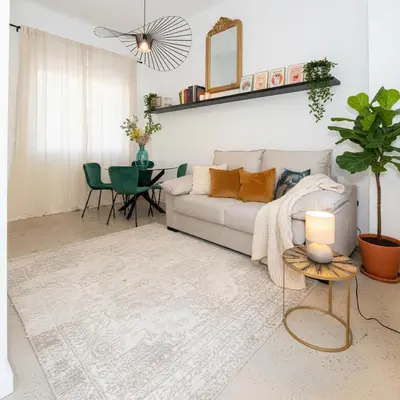 a living room with a couch and a table at Casa Ambrosia in Valencia