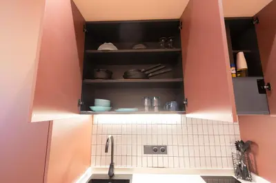 a kitchen with a sink and a cupboard at Blue City Apartments in Valencia