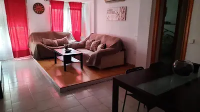 a living room with a couch and a coffee table at valenia city in Valencia
