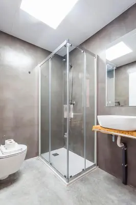 a bathroom with a shower and a toilet and a sink at Ruzafa Confort 3 pax wifi Denia 70 in Valencia