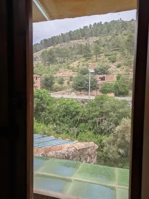 a view from a window of a tennis court at Casa rural El Mestre in Alcudia de Veo