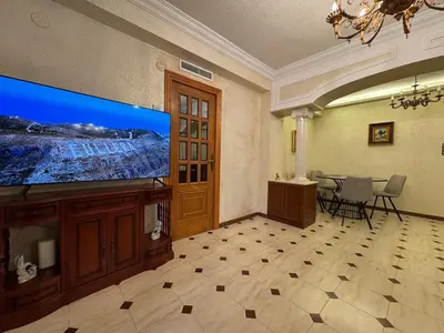 a large living room with a large flat screen tv at Wagner Playa Apartment in Cullera