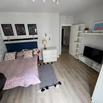 Habitación en el centro con balcón