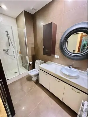 a bathroom with a sink and a toilet and a mirror at Cozy apartment in the old town - San Ramon in Valencia
