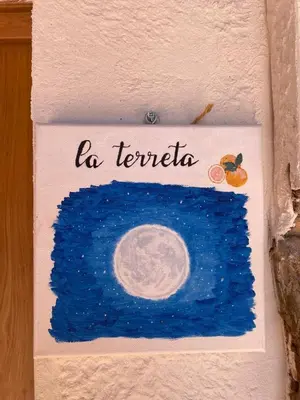 a painting on a wall with the words la terrier at La Terreta hotel casa rural in El Brosquil