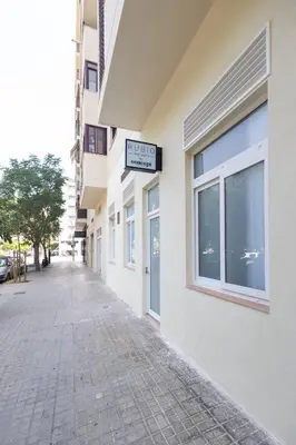 a street sign on the side of a building at Rubio Rooms by Concept in Valencia