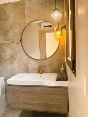 a bathroom with a sink and a mirror at Piscina & Espacio & Confort entre Playa y Montaña in San Antonio de Banageber