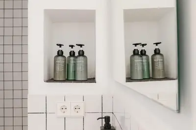 a bathroom with four oxygen bottles on a shelf at Penthouse with Terrace 2 Bedrooms 2 Bathrooms in Valencia
