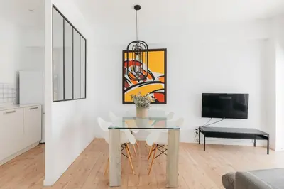 a dining room with a glass table and chairs at Penthouse with Terrace 2 Bedrooms 2 Bathrooms in Valencia