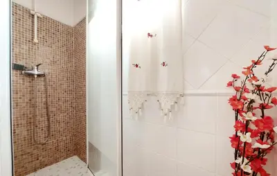 a bathroom with a shower with a shower curtain at Awesome Home In Bétera in Bétera