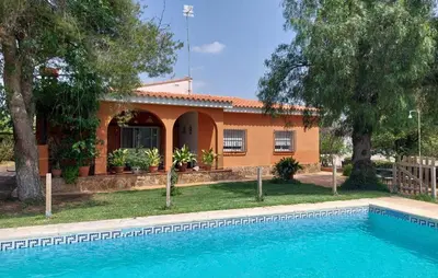 a house with a swimming pool in front of a house at Awesome Home In Bétera in Bétera