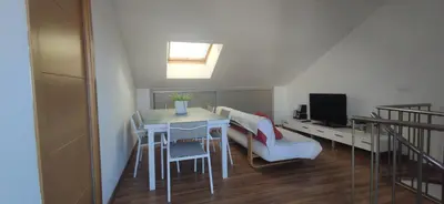 a kitchen with a washer and a washing machine at Precioso Duplex a orilla del mar y con piscina in Moncófar
