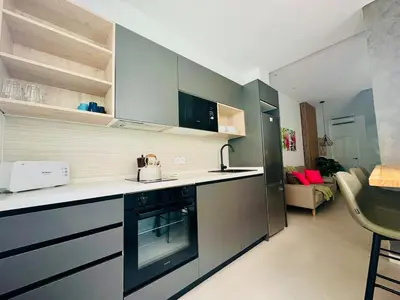 a kitchen with a sink and a stove at PLANAS 3 Designer Aparment with Terraza in Ruzafa SOHO in Valencia